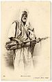 Gnawa from Algiers with his guembri (circa 1906) by Jean Geiser (1848-1923).
