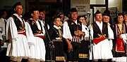 Greek polyphonic group from Dropull wearing skoufos and fustanella
