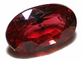 Natural ruby with inclusions.