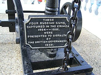 Plaque on Russian gun which reads: These four Russian guns, captured in the Crimea 1854--1856. were presented to Gibraltar by the British Government 1858.