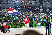 Athletes of Croatia entering during the opening ceremonies of the 2010 Winter Paralympics with the national flag.