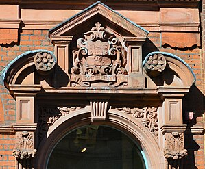 Facade of the Post Office building, showing the coat of arms of the former Municipal Borough of Richmond
