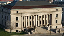 A picture from above of a building with multiple granite columns