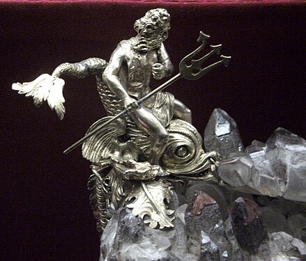 Detail of a silver Neptune in the mount of a crystal piece, probably by Reinhold Vasters about 1865–70, despite spurious 16th-century marks on the metal.[62]