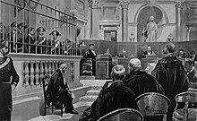 Illustration of Gaetano Bresci's trial, in which Bresci is standing in a cage while being defended by his lawyer Francesco Merlino