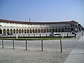 The porticoed hemicycle of the piazza