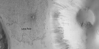 Close view of lava flow, as seen by HiRISE under HiWish program. Dark slope streaks are also visible.