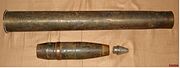 Brass-washed steel case and HE-shell for the German 7,62 cm Pak. 36 anti-tank gun.