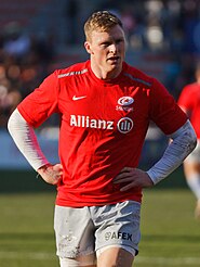 Chris Ashton wearing a [[Saracens F.C.�Saracens]] red warm-up shirt in 2014