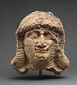 Female head; circa 2000-1600 BC; ceramic; 18 x 12.7 cm; Metropolitan Museum of Art (New York City)