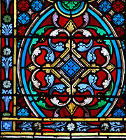 Skilled glass cutting and leading in a 19th-century window at Meaux Cathedral, France.