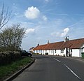 A row of white-washed cottages at Kingston