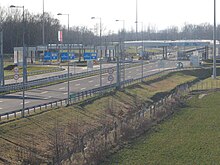 Highway border crossing, with toll booths