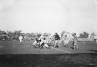 A game between the Hamilton Tigers and the Ottawa Rough Riders, 1910