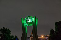 Green outdoor monument of Italy on a globe