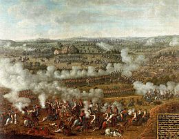 Paitning of armies in formation exchanging musket fire across a hilly landscape.