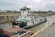 Towboat Enid Dibert departing main lock at McAlpine Locks on Ohio River, Louisville, Kentucky, USA, 1999