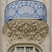 Art Nouveau balcony with a relief under it, on the façade of the Hôtel Brion from Strasbourg, France