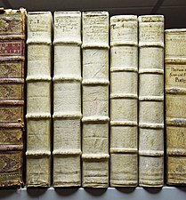 Spines of old books bound in leather.