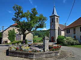 The church and water trough in Vaudrivillers
