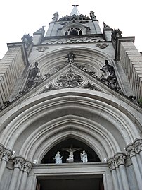 Lower facade, with Gothic revival portal
