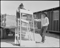 Apaches unloading bed frames for Japanese internees on April 29, 1942.