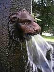 Gargoyle spewing water as part of a fountain Prčice, Sedlec-Prčice, Příbram District, Central Bohemian Region, the Czech Republic. Vítek's Square