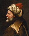 A portrait of a turbaned, white-bearded man