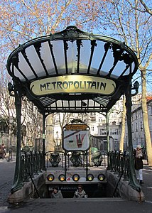Paris Métro station entrance at Abbesses designed by Hector Guimard for the CMP