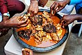 A family eating fufu