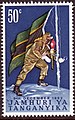 Lieutenant Alex Nyirenda rising Tanganyika flag at Uhuru peak (50 cents stamp)