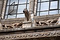 Terracotta sculptures of a Sabre-toothed tiger and lizards, below the second-floor windows of the east wing, Natural History Museum