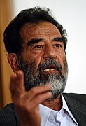 Saddam Hussein at trial, July 2004-edit1