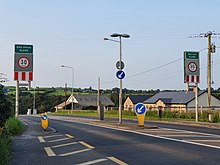Signposts showing the entry to Slane, as well as the 30km/h speed limit