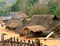 An Akha village, with traditional thatched roofs, in northern Thailand