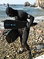 Spearfisher in wet suit.