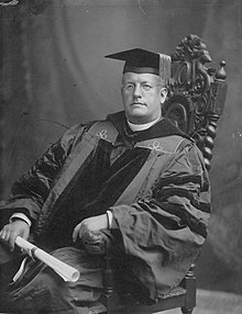 Portrait of John D. Whitney seated