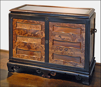 cabinet of ash wood, oak and poplar, with marquetry of colored woods and sculpted bronze, by Émile Gallé presented at the 1900 Paris Exposition (1900), (Musée des Arts Décoratifs, Paris)