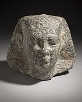 Head of a pharaoh, wearing the nemes