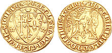 A gold coin depicting a coat of arms on one side, and an angel and the Virgin on the other side.