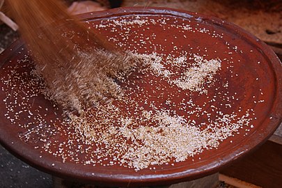 Amaranth being roasted in a comal