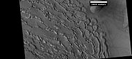 Well developed ribbed upper plains material. These start with small cracks that expand as ice sublimates from the surfaces of the crack. Picture was taken with HiRISE under HiWish program