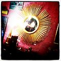 The sunburst wall mirror and clock in either silver or gold is a regular feature of the Hollywood Regency style.