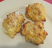 Three shaggy biscuits on a plate