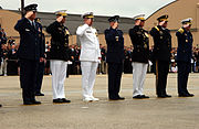 Members of The Joint Chiefs of Staff render a salute during the departure ceremony at Andrews Air Force Base.