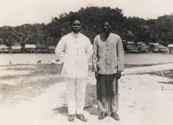 Two Papuan raja wearing kopiah in Kokas, Fakfak (between 1933 and 1936).