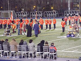 Prince Charles, Prince of Wales, presents new colours to the Royal Regiment of Canada and Toronto Scottish Regiment at Varsity Stadium in Toronto, 5 November 2009.