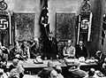 Image 6Adolf Hitler (standing) delivers a speech in February 1925 (from 1920s)