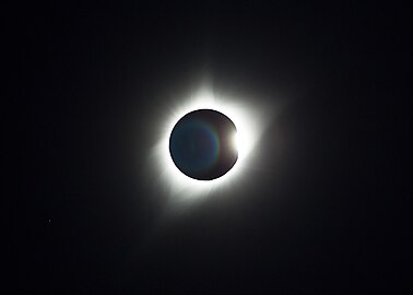 The diamond ring effect as totality ends during the total solar eclipse of August 21, 2017, in central Wyoming. The rainbow coloration is a lens flare and not a natural phenomenon.