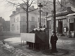 A pissoir with three stalls, Paris, c. 1865